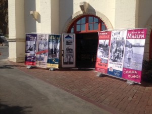 Old posters of famous people on Catalina Island - Winston Churchill belonged to its yacht club, Natalie Wood drowned here, Norma Rae (Marilyn Monroe) picnicked here)