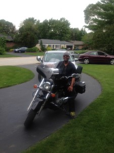 Erin's husband Dan on their new motorcycle
